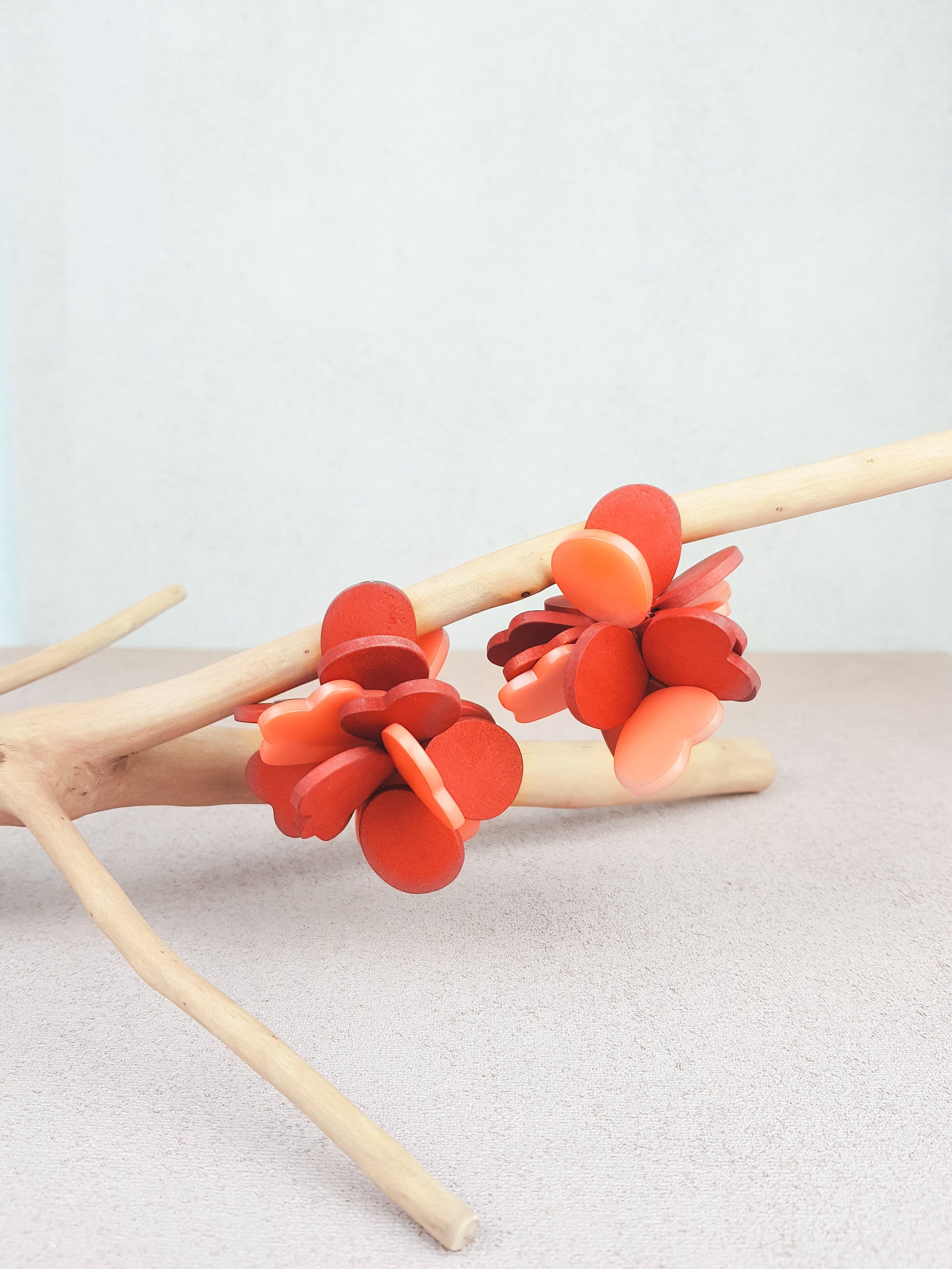 Handmade wood and acrylic ear post cluster earrings in red and pink